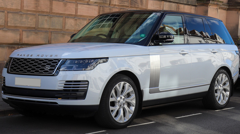 A L405 Land Rover Range Rover Autobiography parked next to a building