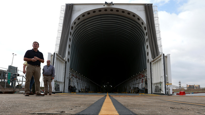 A front view of the NASA Pegasus barge with its cargo hold open