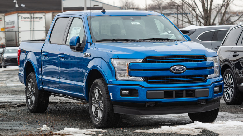 Front 3/4 view of a blue 2020 Ford F-150.