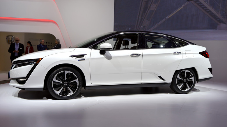 A white Honda Clarity at an auto show