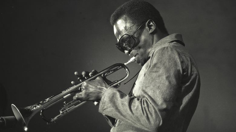 Miles Davis playing trumpet