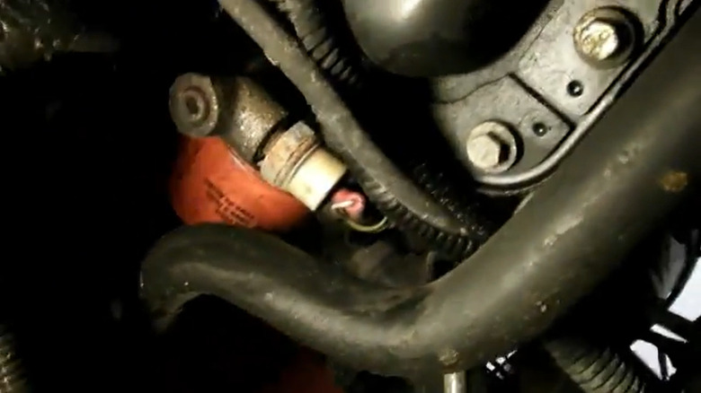 An MN12 Ford Thunderbird's oil filter location