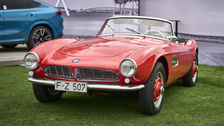 A red BMW 507 at the 2023 Amelia Island Concours.