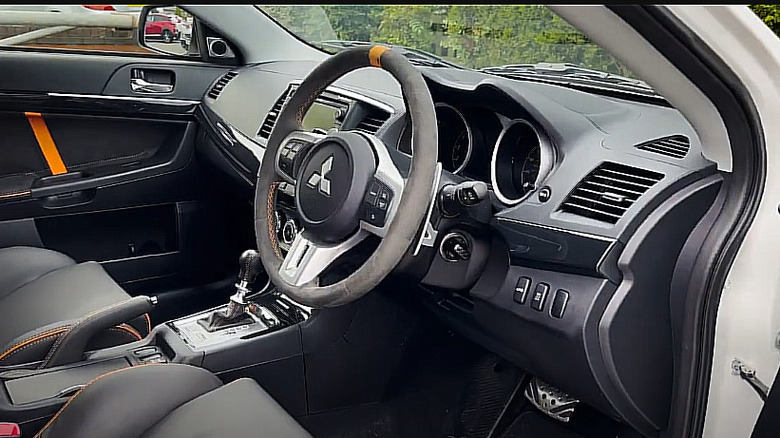 RHD cockpit of a 2014 Mitsubishi Lancer Evolution X FQ-440 MR