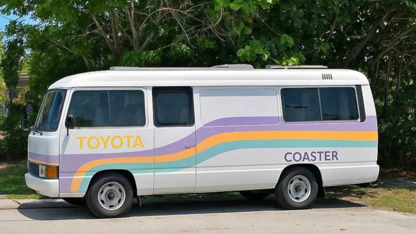 This Toyota Coaster With 6 Feet Of Head Room And A Queen Size Bed Is The Perfect Getaway Vehicle For Tall Kings