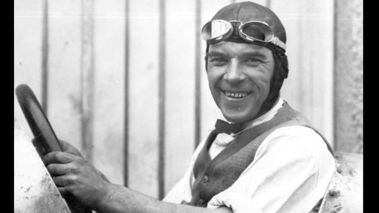Sig Haughdahl behind the wheel of his car