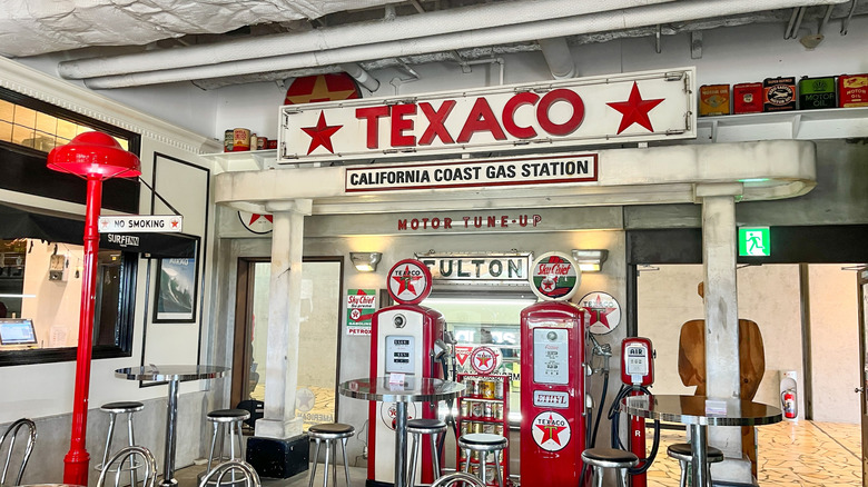 A vintage Texaco-themed gas station bar