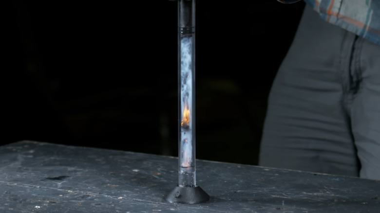 Explaining compression ignition in diesel engines using a fire piston.