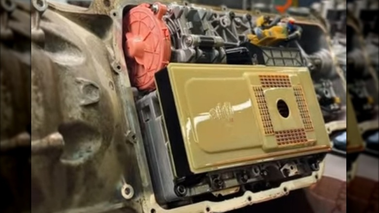 Looking inside a TorqShift 10R140 transmission at the filter and pump.