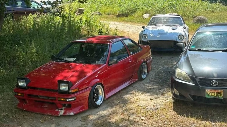 A red Toyota Corolla next to a Lexus IS and Datsun 280ZX