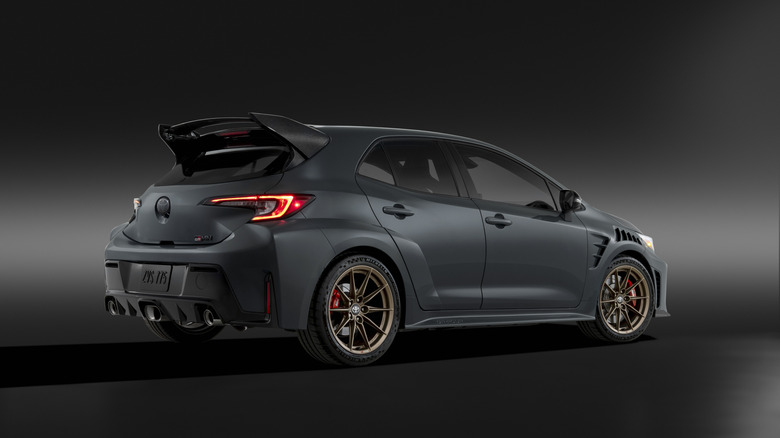 Rear three quarter view of the GRMN Corolla, showing the wing
