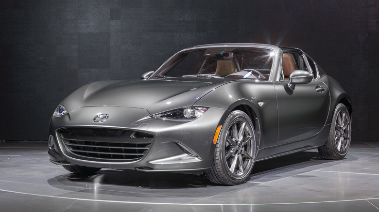 Product image of a dark grey 2018 Mazda MX-5 Miata.