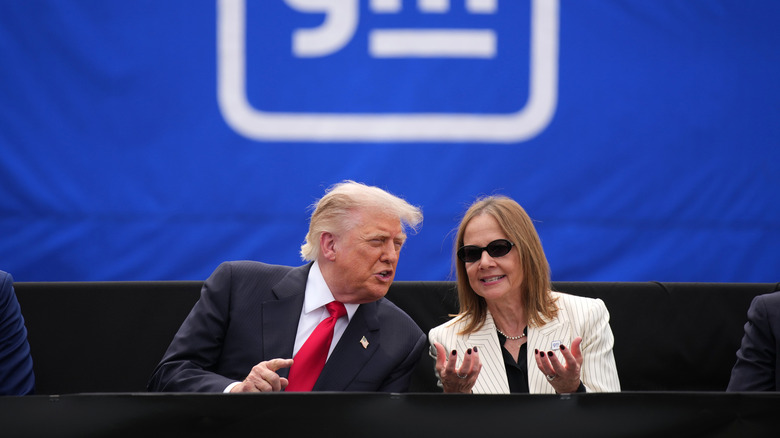 MILFORD, MICHIGAN - JULY 27: U.S. President Donald Trump sits with GM CEO Mary Barra at General Motors' Milford Proving Grounds on July 27, 2026 in Milford, Michigan. Trump is expected to address US auto manufacturing, tariffs and show support for Republican candidates ahead of the August 4 primary during the visit. (Photo by Andrew Harnik/Getty Images)