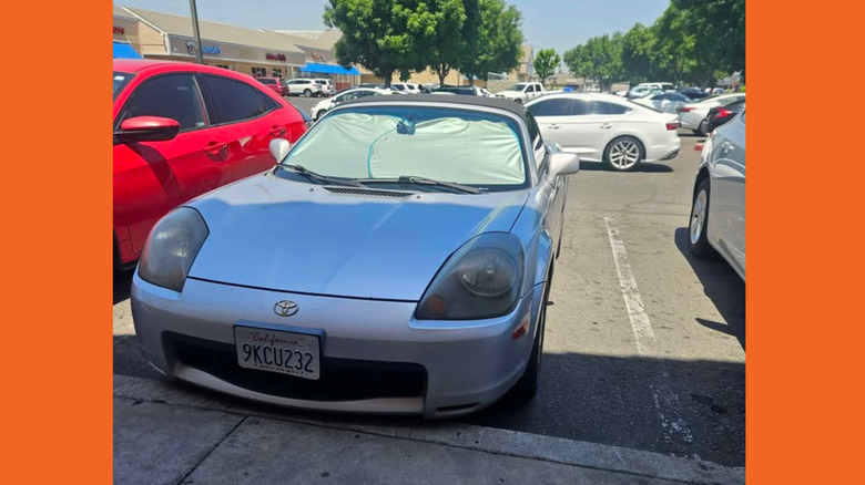 A silver Toyota MR-2 Spyder