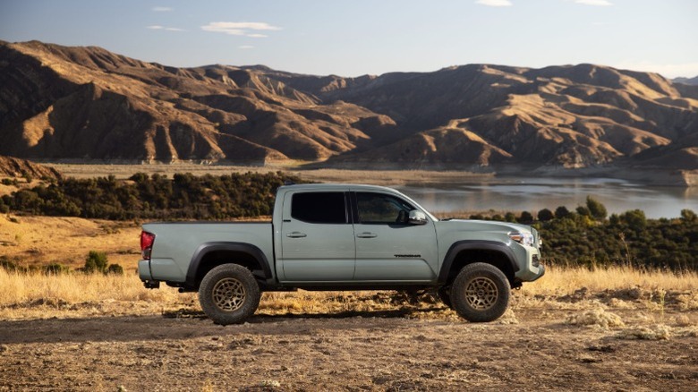 2023 Toyota Tacoma Trail parked near a lake