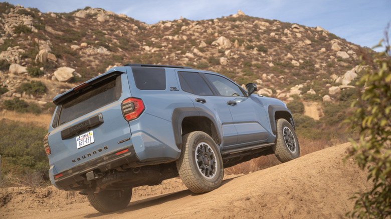 2025 Toyota 4Runner climbing a trail in the mountains