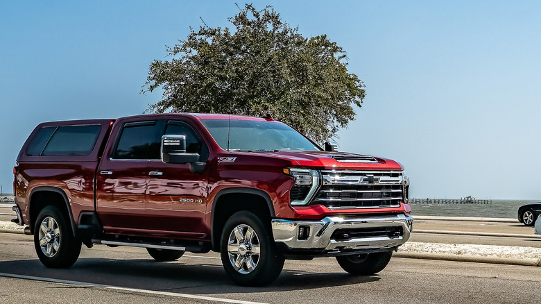 Gulfport, MS - October 04, 2023: Wide angle front corner view of a 2024 Chevrolet Silverado 2500HD Z71 SUV at a local car show.