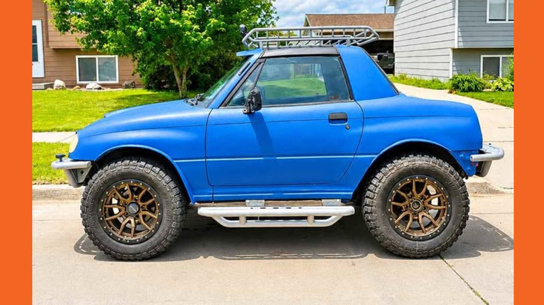 A lifted blue Suzuki X-90