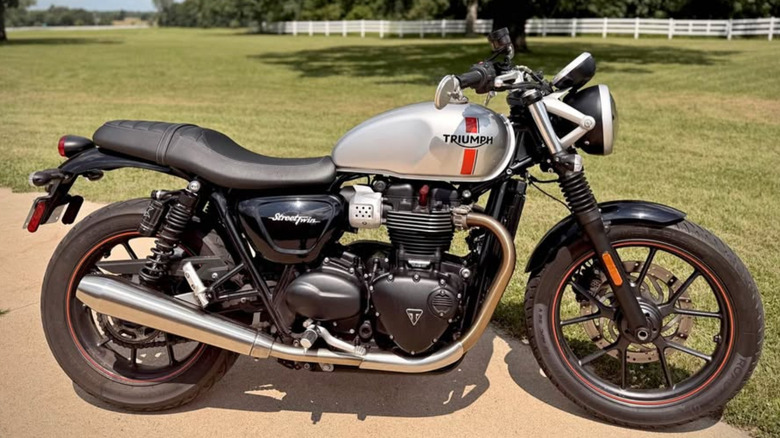 A silver Triumph Street Twin