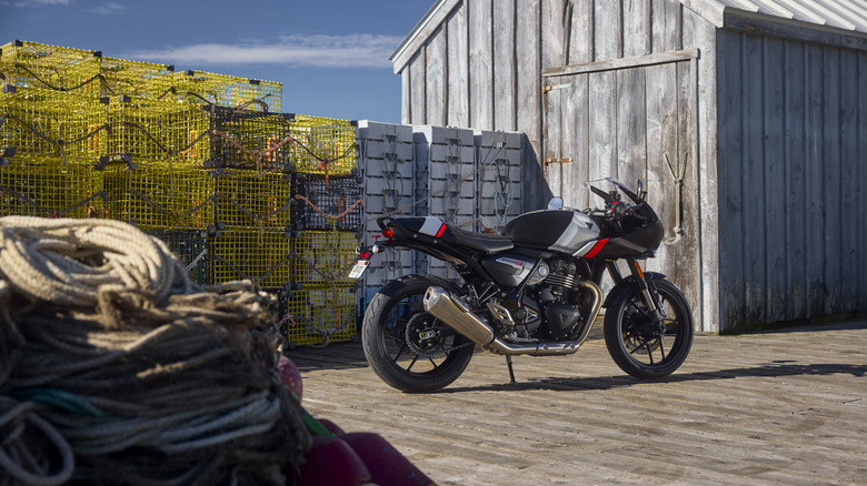 A black, gray, and red Triumph Thruxton 400