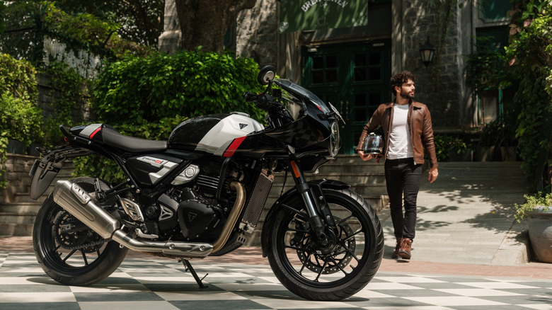 A black, gray, and red Triumph Thruxton 400