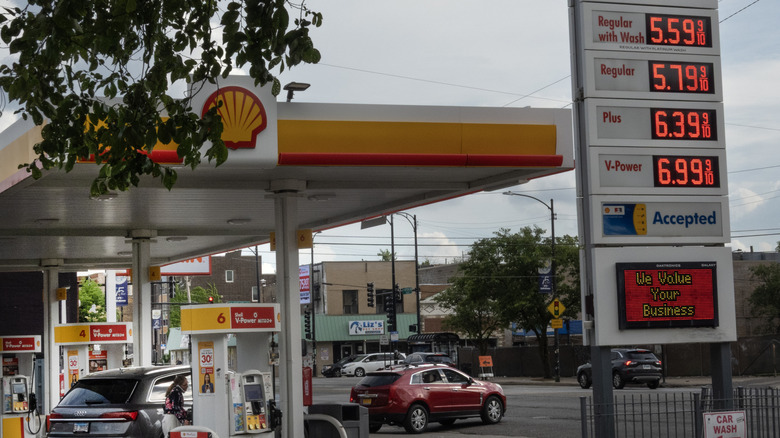 a gas station showing high prices in the midwest in June 2026