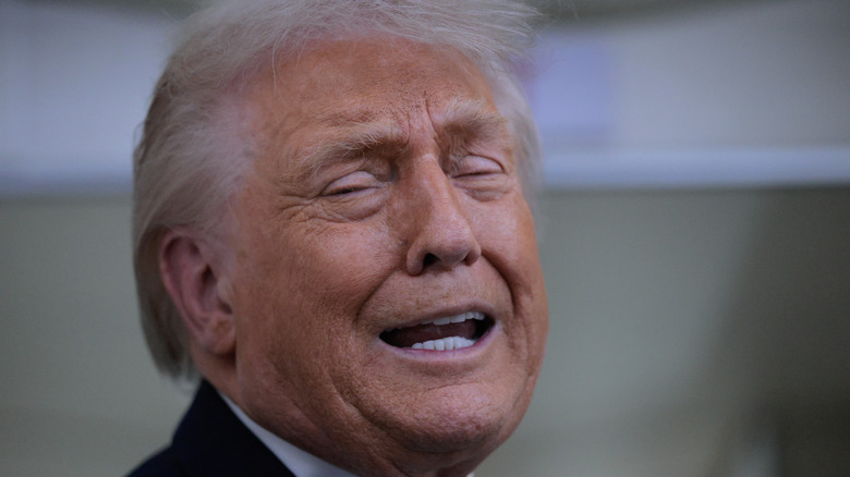 IN FLIGHT - JANUARY 22: U.S. President Donald Trump speaks to reporters on board Air Force One while flying in between Ireland and Washington as he returns from the World Economic Forum on January 22, 2026. Following a meeting with NATO Secretary General Mark Rutte, Trump announced a deal with European leaders on the semi-autonomous Danish territory of Greenland during the annual meeting of political and business leaders in Davos