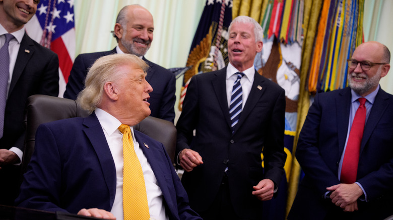 Donald Trump yukking it up with Chris Wright and Russell Vought
