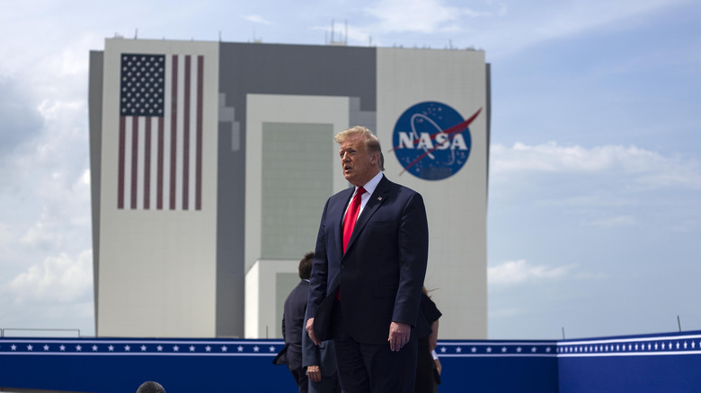 President Donald Trump speaks on the rooftop of the Operational Building at NASA after the launch of the SpaceX Falcon 9 rocket with NASA astronauts Bob Behnken (R) and Doug Hurley aboard the rocket from the Kennedy Space Center on May 30, 2020 in Cape Canaveral, Florida.