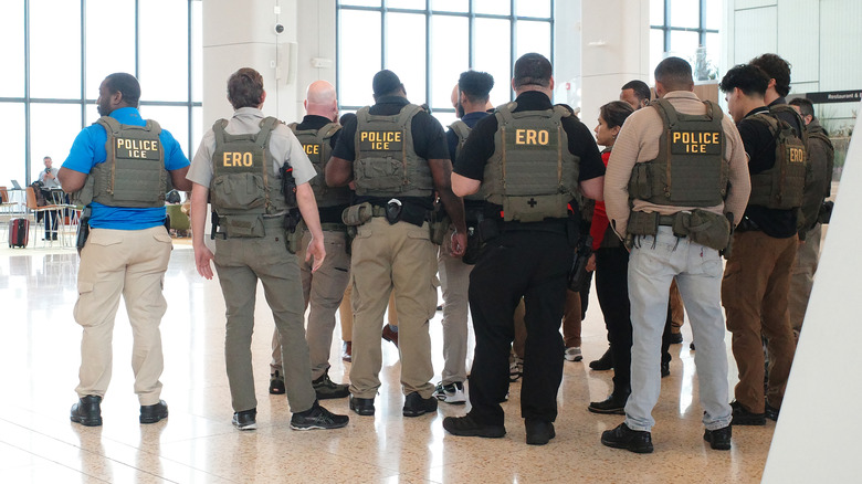 Immigration and Customs Enforcement (ICE) agents patrol Terminal B at LaGuardia Airport on March 23, 2026 in New York City.