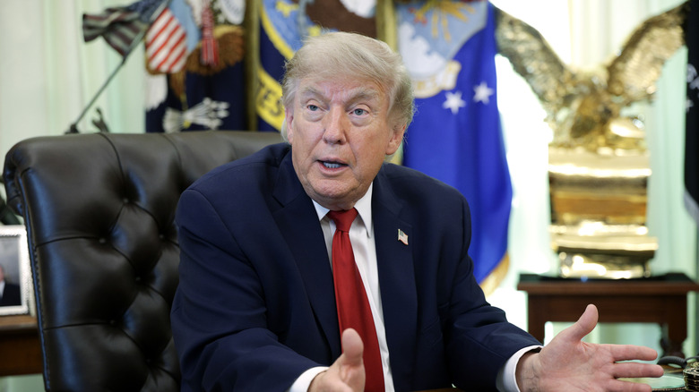 WASHINGTON, DC - JUNE 29: U.S. President Donald Trump talks to reporters after signing an executive order dealing with automobile repairs with Environmental Protection Agency Administrator Lee Zeldin in the Oval Office at the White House on June 29, 2026 in Washington, DC. Trump followed up the signing by answering questions about the SAVE America Act. (Photo by Alex Wong/Getty Images)