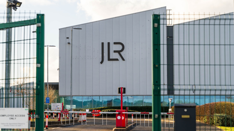 Jaguar Land Rover motor company logo and name outside of a car engine factory
