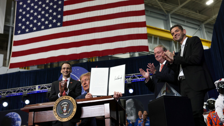 President Donald Trump signs an executive order to establish the United States Space Academy on August 28, 2026