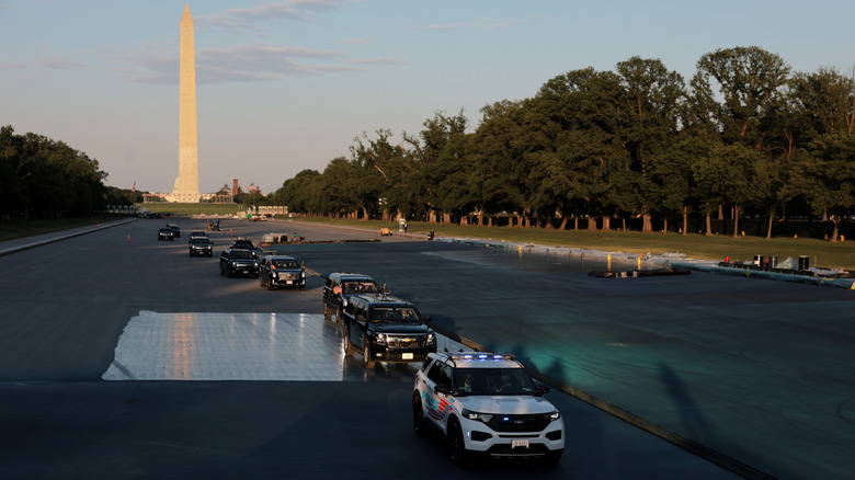President Trump's motorcade drives across the drained Reflecting Pool on May 7, 2026