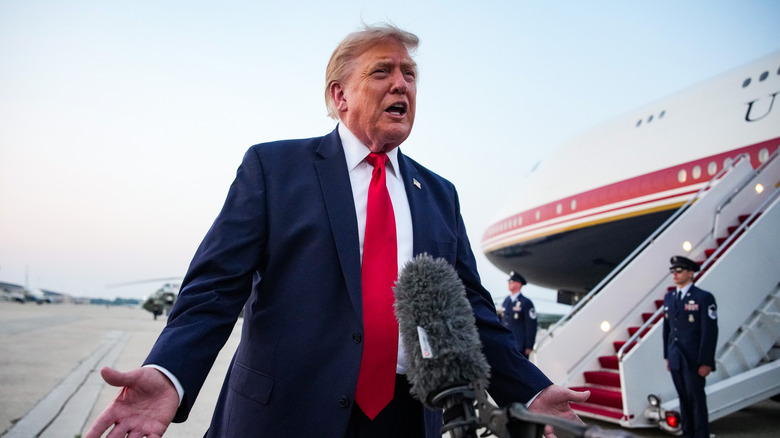 US President Donald Trump speaks to reporters after landing in Air Force One on July 19, 2026 in Joint Base Andrews, Maryland. Trump is returning to the White House after attending the FIFA World Cup 2026 Final where Spain defeated reigning World Cup champions Argentina, who were led by Lionel Messi, with the lone goal coming from Ferran Torres #7 in the 106th minute of extra time.