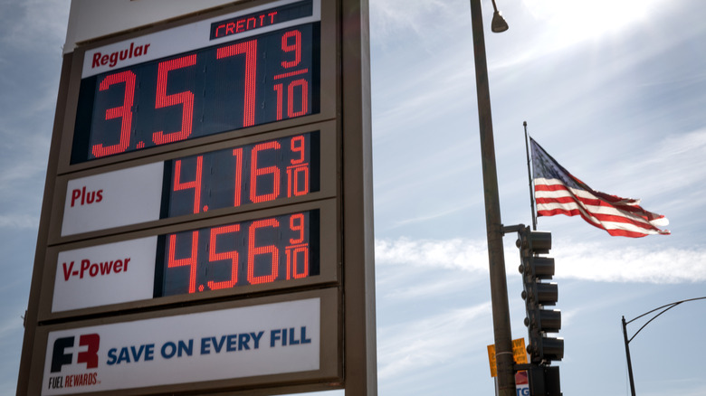 sign displays prices for gasoline at a station on March 02, 2026 in Chicago, Illinois.