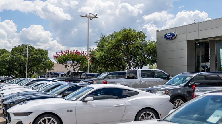 Ford Mustang Mach-E vehicles are seen for sale on a dealership lot on June 24, 2025 in Austin, Texas.