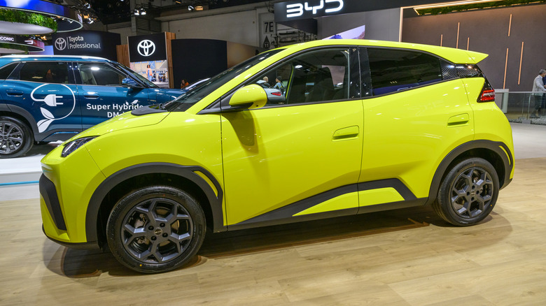 Yellow BYD Seagull sitting at an auto show.