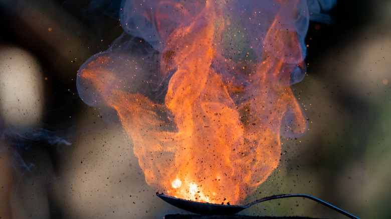 Gunpowder igniting up close.