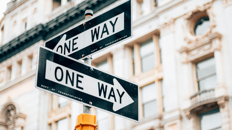 A pair of one-way street signs