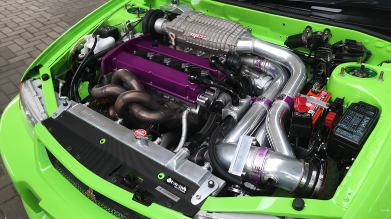 A 600-horsepower twin-charged engine in a modified Mitsubishi Evo V
