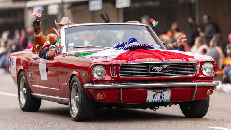 A vintage Ford Mustang connected nan streets of Brownsville, Texas during a parade