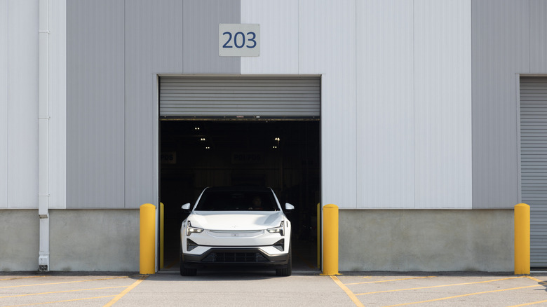 A Polestar 3 rolling out of an assembly plant