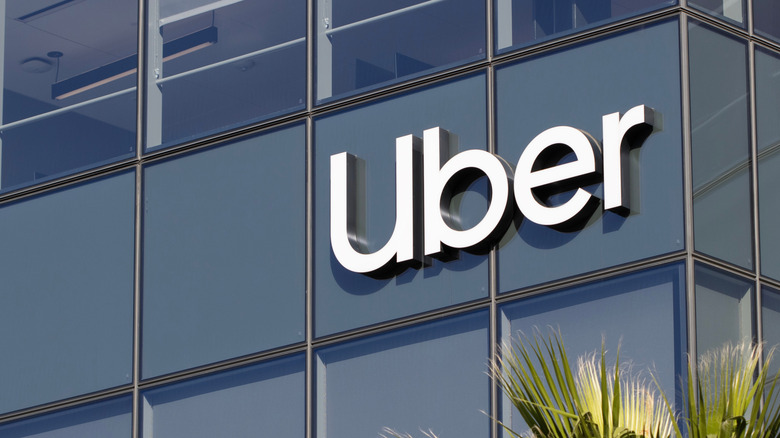 The Uber logo on the side of a building.