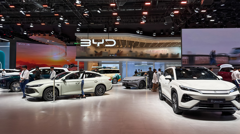 SHENZHEN, CHINA - JUNE 3: Visitors view BYD vehicles at the company's booth during the 30th Guangdong-Hong Kong-Macao Greater Bay Area Auto Show on June 3, 2026, in Shenzhen, Guangdong Province, China. The annual auto show showcases new vehicle models, electric mobility technologies and automotive innovations, highlighting the rapid growth of China's new energy vehicle industry. (Photo by Cheng Xin/Getty Images)