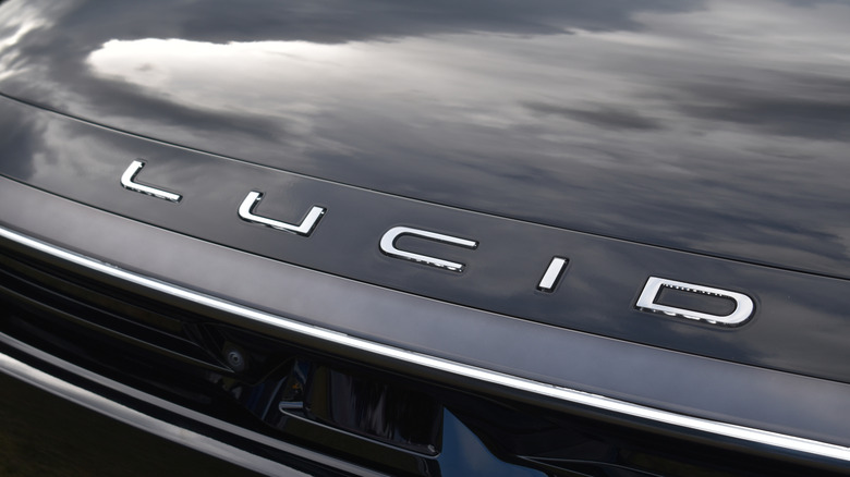 Beesd, the Netherlands - September 12, 2025: close up shot, the Lucid emblem of a black Lucid Gravity