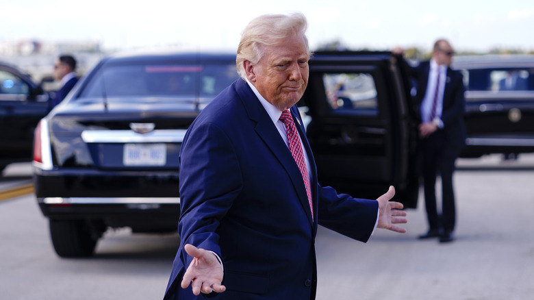 U.S. President Donald Trump speaks to the media after departing Air Force One at Miami International Airport on March 27, 2026 in Miami, Florida.