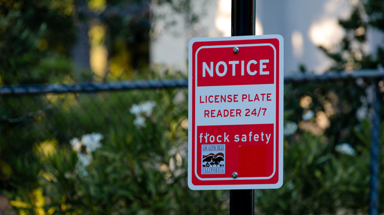 A red and white sign warns drivers of an automated license plate reader in California's Los Altos Hills area.