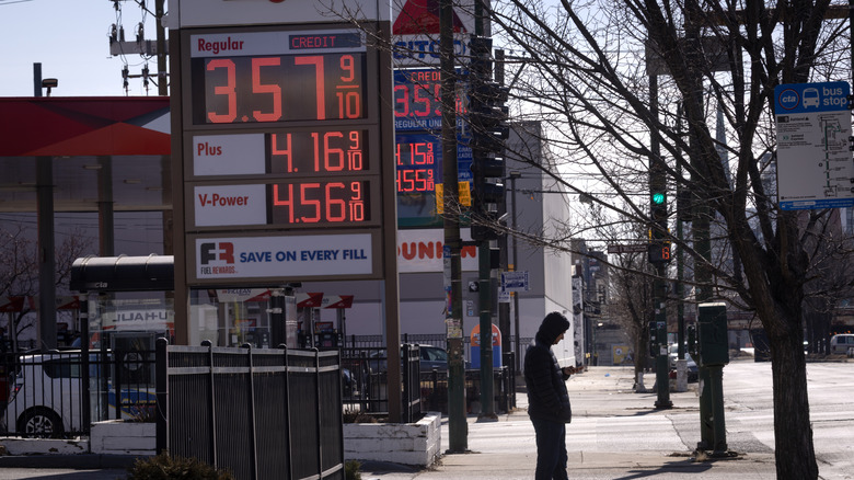A sign displays prices for gasoline at a station on March 02, 2026 in Chicago, Illinois.