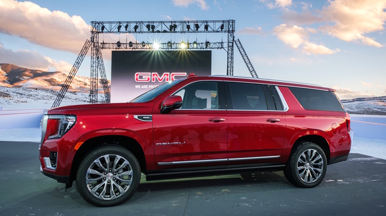 A red 2021 GMC Yukon XL at a GMC media event.